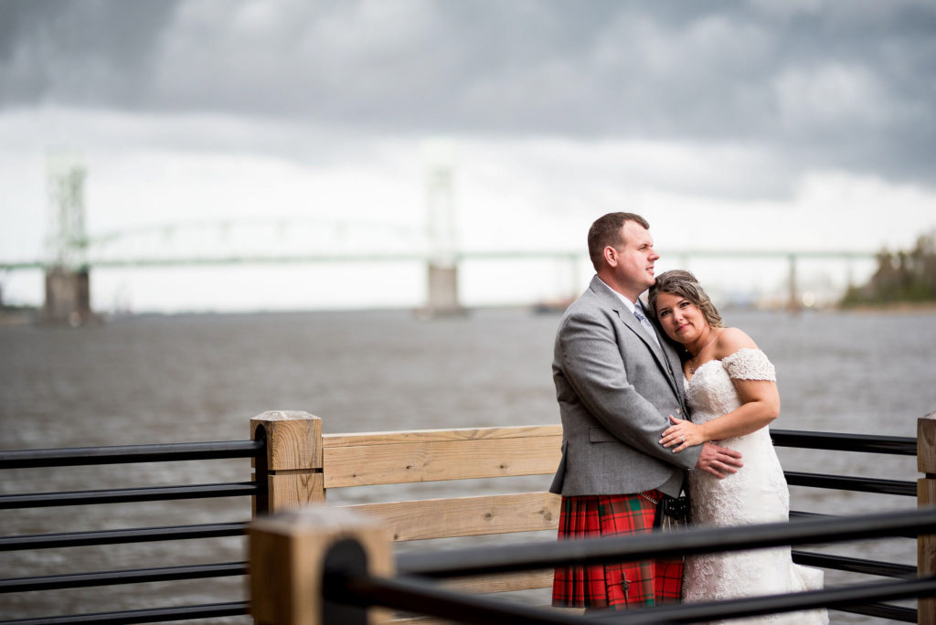 Wilmington North Carolina downtown wedding bride and groom by bridge