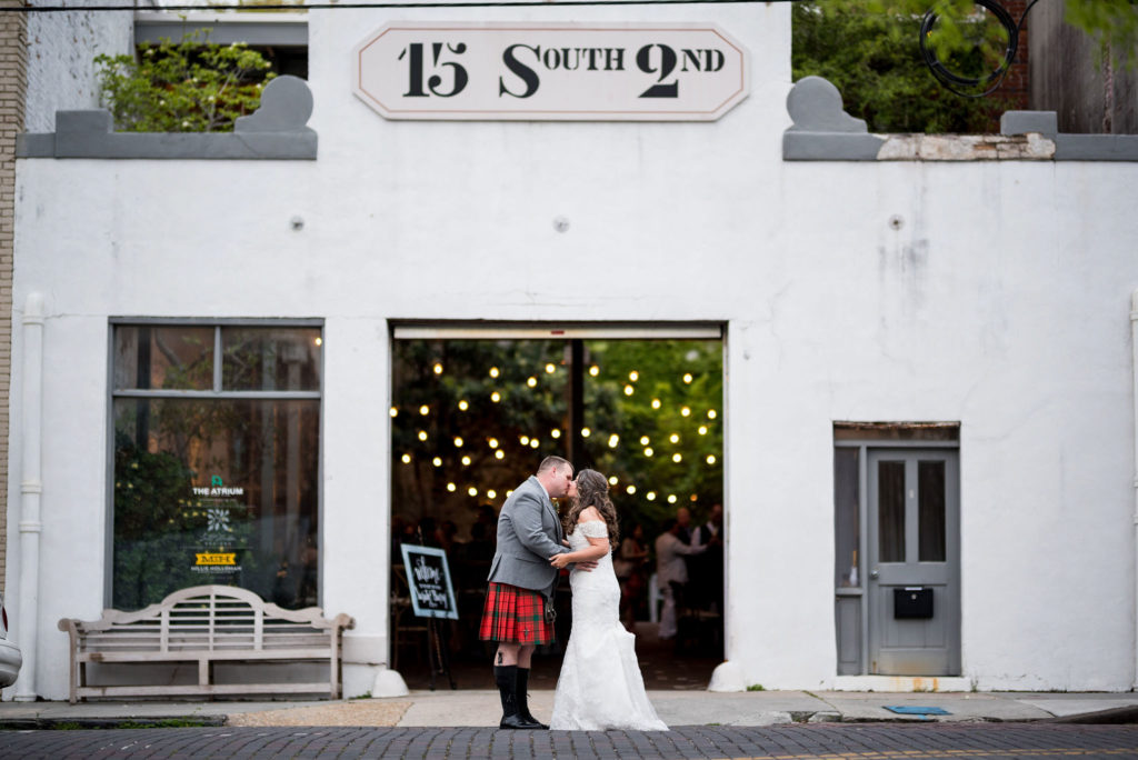 Wilmington North Carolina downtown wedding bride and groom kiss