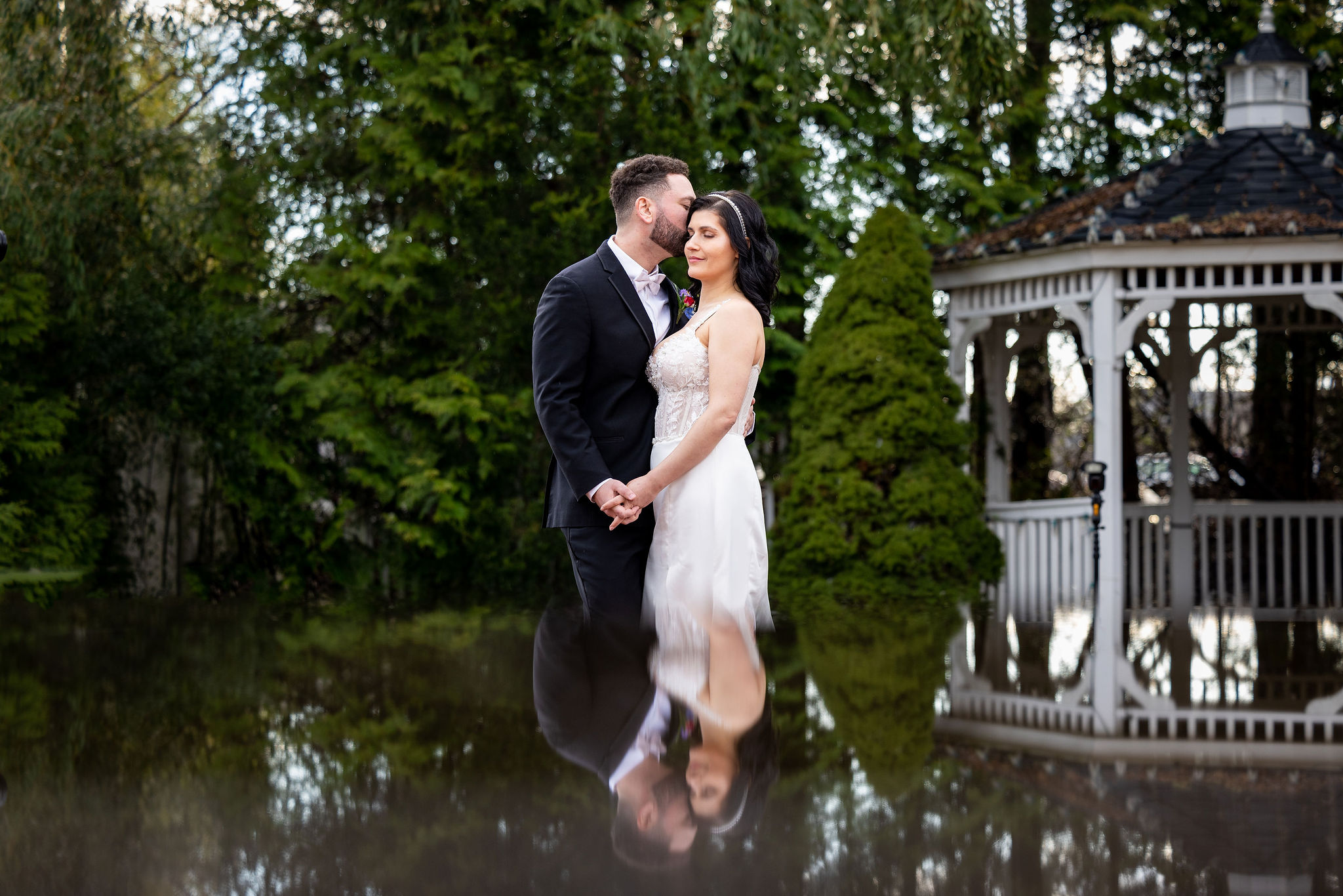 bride and groom reflection