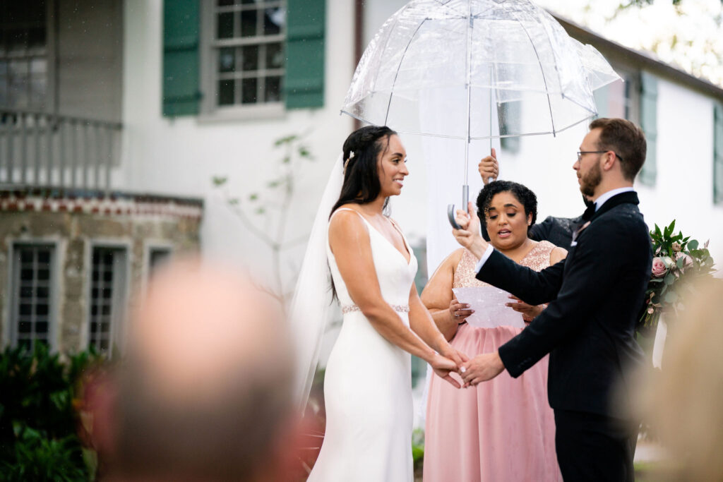 rainy wedding bride and groom